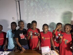Kids presenting their made robots in teams