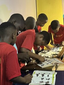 kids assembling a robot